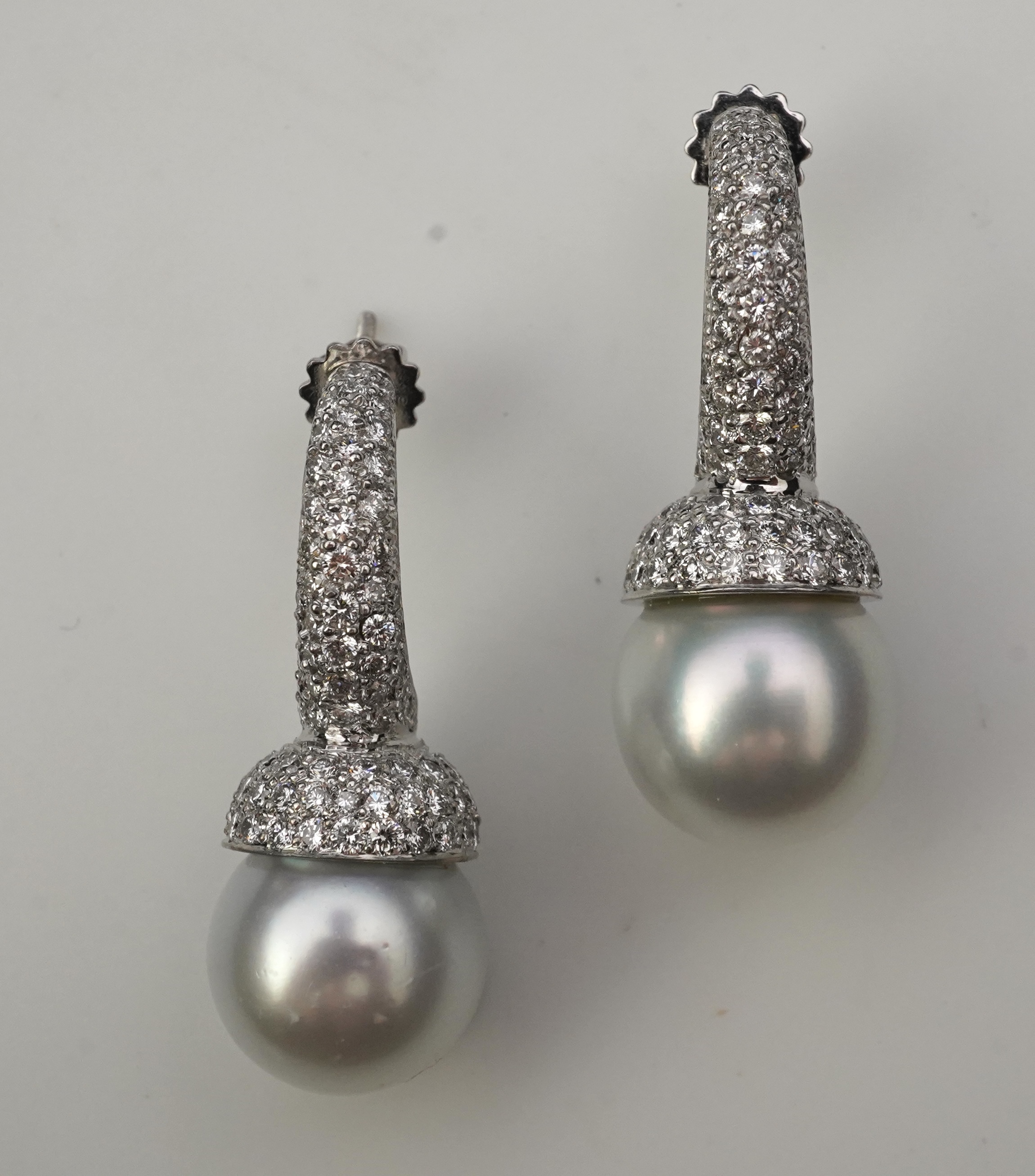 A pair of South Sea cultured pearl and diamond earrings